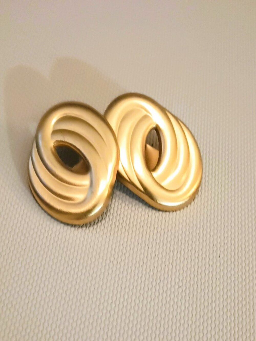 Monet Gold Tone Clip On Earrings Vintage Matte Swirl Oval Statement Jewelry